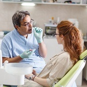 Dentist and patient talking