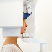 CT Scanner scanning woman