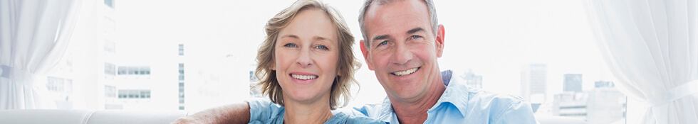 couple wearing blue smiling