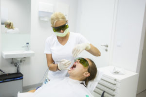 Patient receive laser dentistry